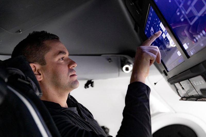 Jared Isaacman inside a Dragon capsule.