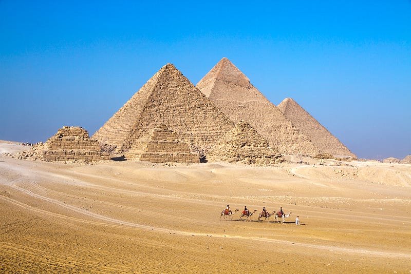 Pyramids of Giza amidst the city landscape