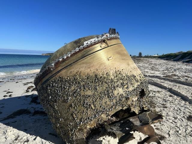 Giant metal cylinder discovered on a beach