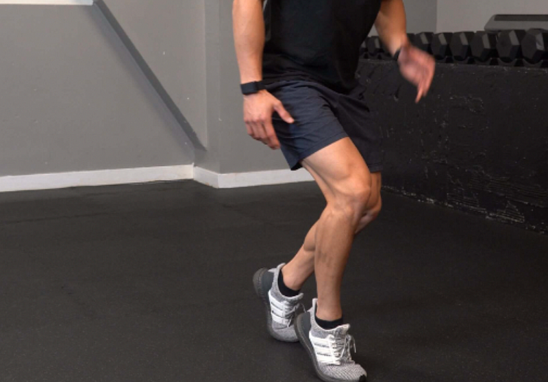 Loaded toe march exercise for leg activation.